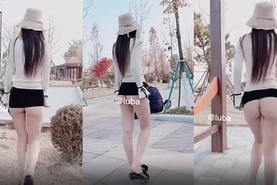 妹子在街上露屁股走街哦秀性感的屁股